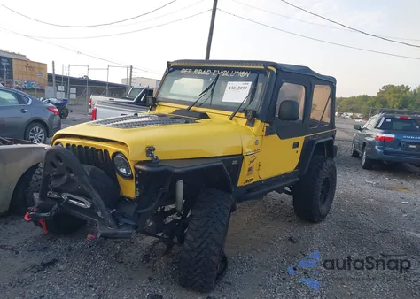 1999 Jeep Wrangler Sport z USA, uszkodzony, nr VIN 1J4FY19SXXP475549